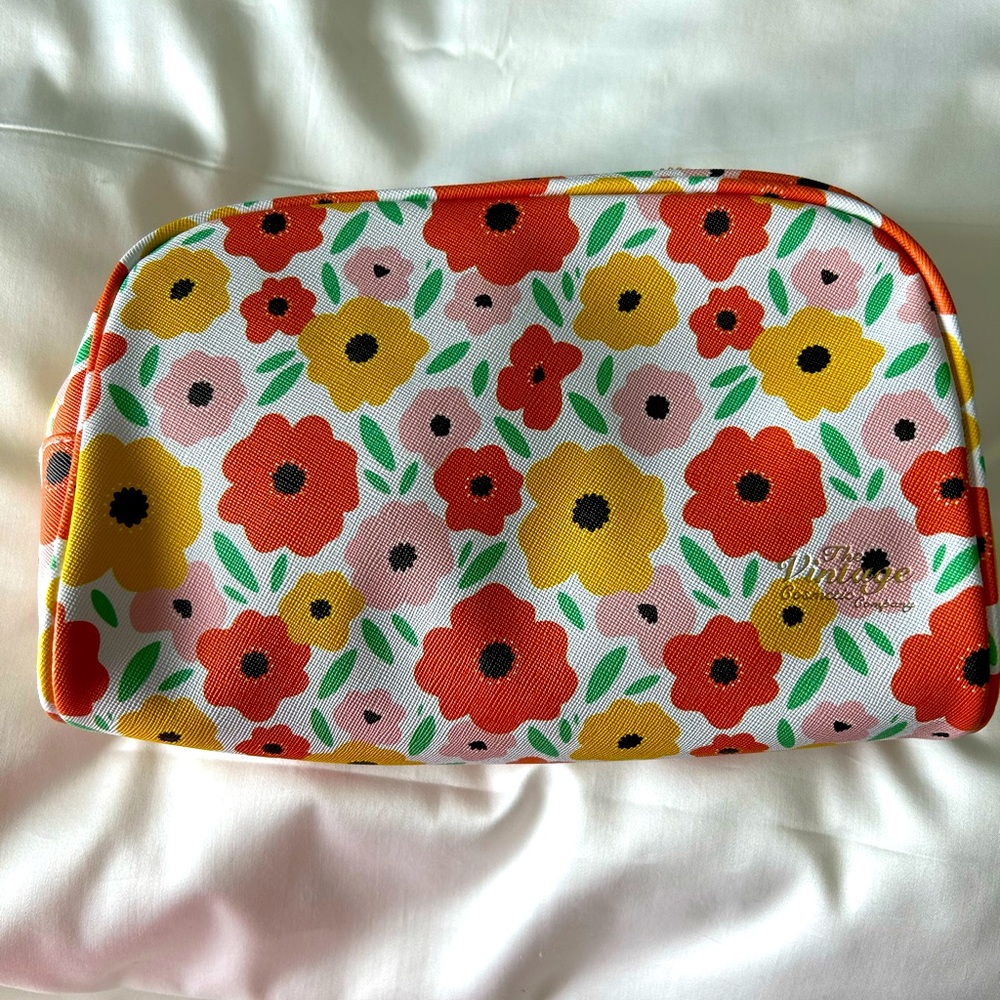The Vintage Cosmetics Company makeup bag. Zip top. Brand new! White with floral